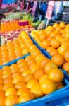 Many Oranges In Crates On Market Stock Photo