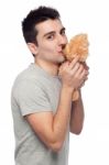 Man Kissing Teddy Bear Stock Photo