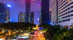 Traffic And Cityscape At Night In Guangzhou, China Stock Photo