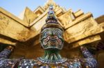 Giant Statue Carrying Gold Pagoda At Wat Phra Kaew Stock Photo