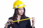 Young Engineer Holding A Cartridge Meter Stock Photo