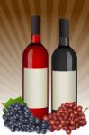 Wine Bottles With Grapes Stock Photo