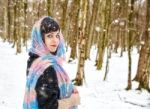 Portrait Of Young Beautiful Woman Walking In The Woods Stock Photo