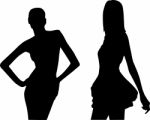 Silhouettes Of Fashion Girls Stock Photo