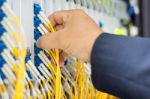 People Fix Node Fiber Optic In Network Room Stock Photo