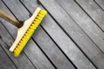 Old Plastic Brush With Bamboo Stick Stock Photo