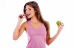 Sexy Girl Eating Chocolate And Apple Stock Photo