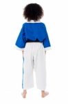 Back Pose Of A Small Girl In Karate Uniform Stock Photo