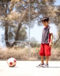 Young Player Ready To Play Soccer Stock Photo