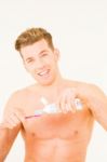 Man With Toothbrush And Toothpaste Stock Photo
