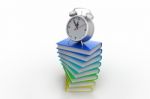 Alarm Clock On Books Stock Photo