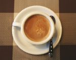 Cup Of Coffee In A White Cup, Selective Focus Stock Photo