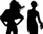 Silhouettes Of Fashion Girls Stock Photo