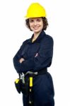 Confident Young Woman In Jumpsuit Stock Photo