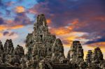 Ancient Stone Faces Of King Jayavarman Vii At The Bayon Temple, Stock Photo