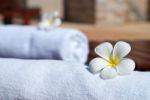 White Flower On Towel Stock Photo