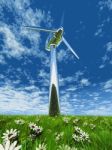 Wind Turbine In Grass And Flowers Stock Photo