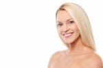 Smiling Woman With Bare Shoulders Stock Photo