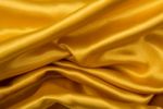 Golden Satin Background Stock Photo