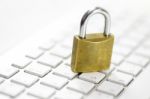 Padlock On White Keyboard Network Security Conception Stock Photo