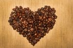 Coffee Beans  In The Shape Of The Heart Stock Photo