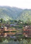 Village Beside Mountain Stock Photo