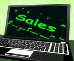 Sales On Laptop Showing Promotions Stock Photo