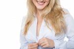 Sensuous Woman Unbuttoning Her Shirt Stock Photo