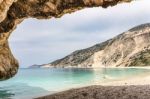 Cave Outlook On Sea Mountain And Beach Stock Photo