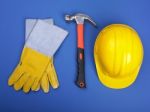 Hard Hat Hammer And Leather Gloves Stock Photo