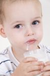 Little Boy Drinking Milk Stock Photo