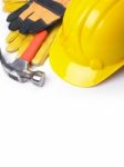 Hard Hat Hammer And Leather Gloves Stock Photo