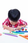 Child Moulding Whale Modeling Clay, On White Background. Strengt Stock Photo