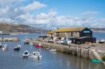 Boats In The Harbour At Lyme Regis Stock Photo