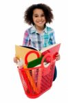 Elementary Age School Girl Reading A Book Stock Photo