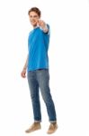 Cheerful Man Pointing Towards Camera Stock Photo