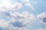 Light Blue Sky With White Close-up Clouds Stock Photo