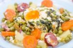 Traditional Green Peas With Egg Stock Photo