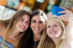 Group Of Friends Taking Selfie In The Street Stock Photo