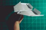 Hand Holding A Paper Airplane Engineering Background Stock Photo