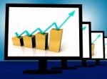 Arrow Going Up On Monitors Shows Financial Growth Stock Photo