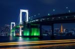 Tokyo Skyline With Rainbow Bridge And Tokyo Tower. Tokyo, Japan Stock Photo