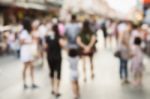 Blurred People Walking On The Street Stock Photo