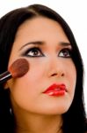 Portrait Of Beautician Doing Cheek Make Up Of Woman Stock Photo