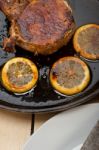 Pork Chop Seared On Iron Skillet Stock Photo