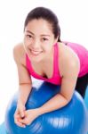 Healthy Woman - Girl Smiling And Leaning Fitness Ball Stock Photo