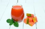 Fresh Tropical Papaya Juice Isolated On A White Background Stock Photo