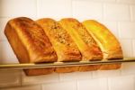 Freshly Kneaded Grain And White Breads For Sale Stock Photo