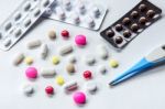 Top View Of The Pills On The White Background, Pack Of Tablet Drug And Capsule Pills On The Floor Stock Photo