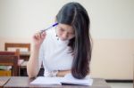 Portrait Of Thai Teen Beautiful Girl Writing Book Stock Photo